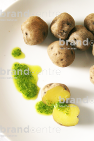 Crumpled potatoes with green mojo